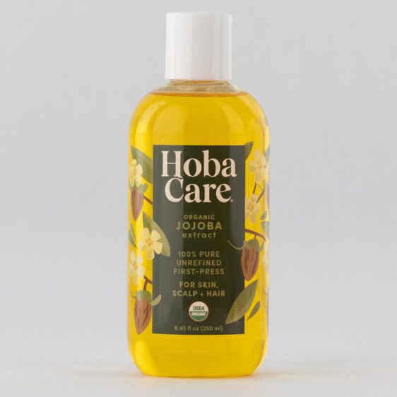 ORG HobaCare 8 oz square clear plastic bottle filled with golden HobaCare Organic jojoba on gray background