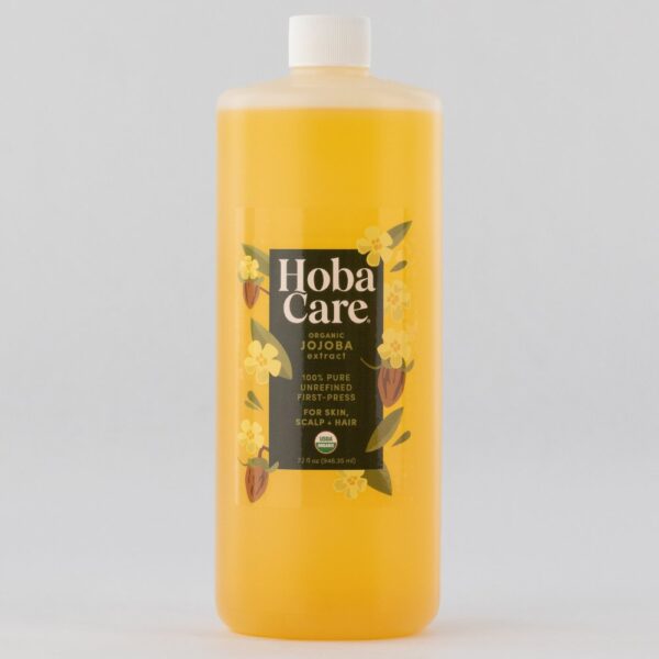 32 oz bottle of golden yellow HobaCare Jojoba Organic Carrier Oil on a gray background