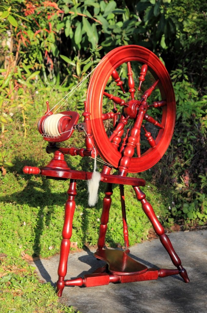 vintage spinning wheel protected with jojoba