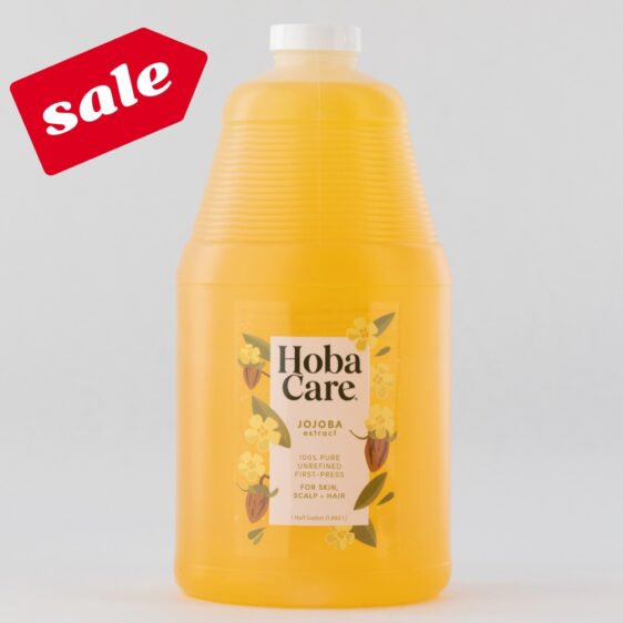 64 fl oz bottle of golden HobaCare Jojoba on light gray background