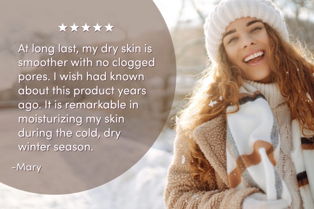 quote about using jojoba oil with image of smiling woman wearing white had and brown coat outside on a sunny winter day with snow on the ground